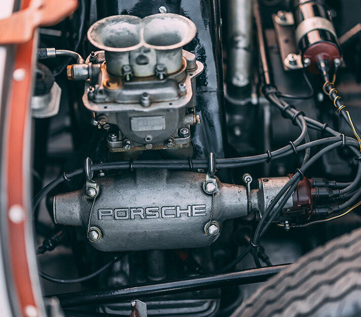 a silver porsche 550 Spyder